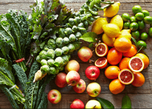 a group of fruits and vegetables on a wood surface Healthy Weight Loss Diets Blackpool